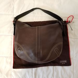 Vintage brown leather Coach hobo shoulder bag.